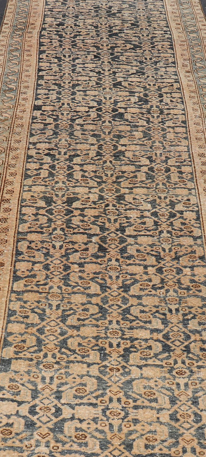 Antique Hamedan Gallery Runner with Herati Design in Dark Gray & Charcoal This vintage Hamedan was hand - knotted in Iran during the 1930's. The center field displays a Herati design, nicknamed the "fish" design in a creamy apricot color. Th... - Keivan Woven ArtsV21 - 211023 - 18523Rug