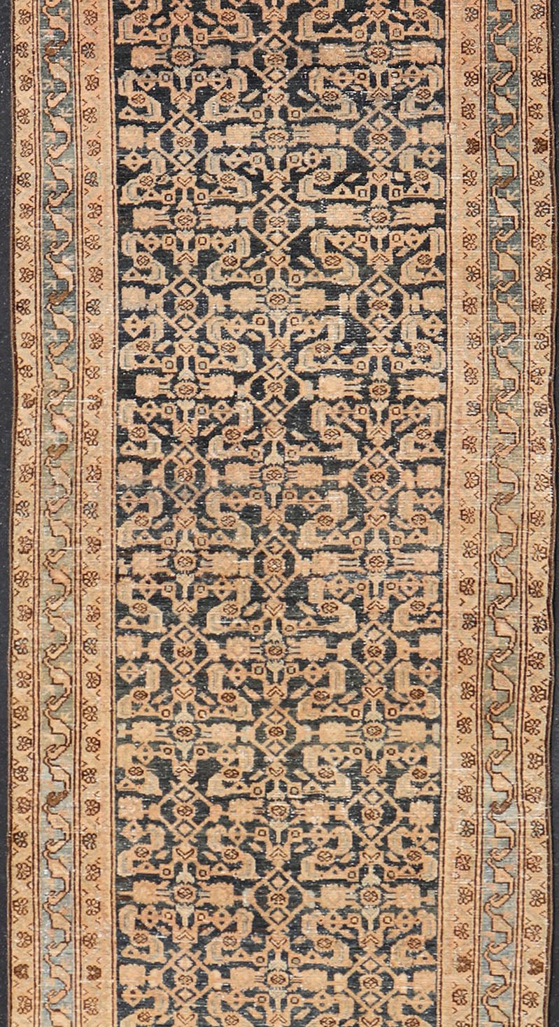 Antique Hamedan Gallery Runner with Herati Design in Dark Gray & Charcoal This vintage Hamedan was hand - knotted in Iran during the 1930's. The center field displays a Herati design, nicknamed the "fish" design in a creamy apricot color. Th... - Keivan Woven ArtsV21 - 211023 - 18523Rug