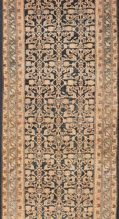 Antique Hamedan Gallery Runner with Herati Design in Dark Gray & Charcoal This vintage Hamedan was hand - knotted in Iran during the 1930's. The center field displays a Herati design, nicknamed the "fish" design in a creamy apricot color. Th... - Keivan Woven ArtsV21 - 211023 - 18523Rug