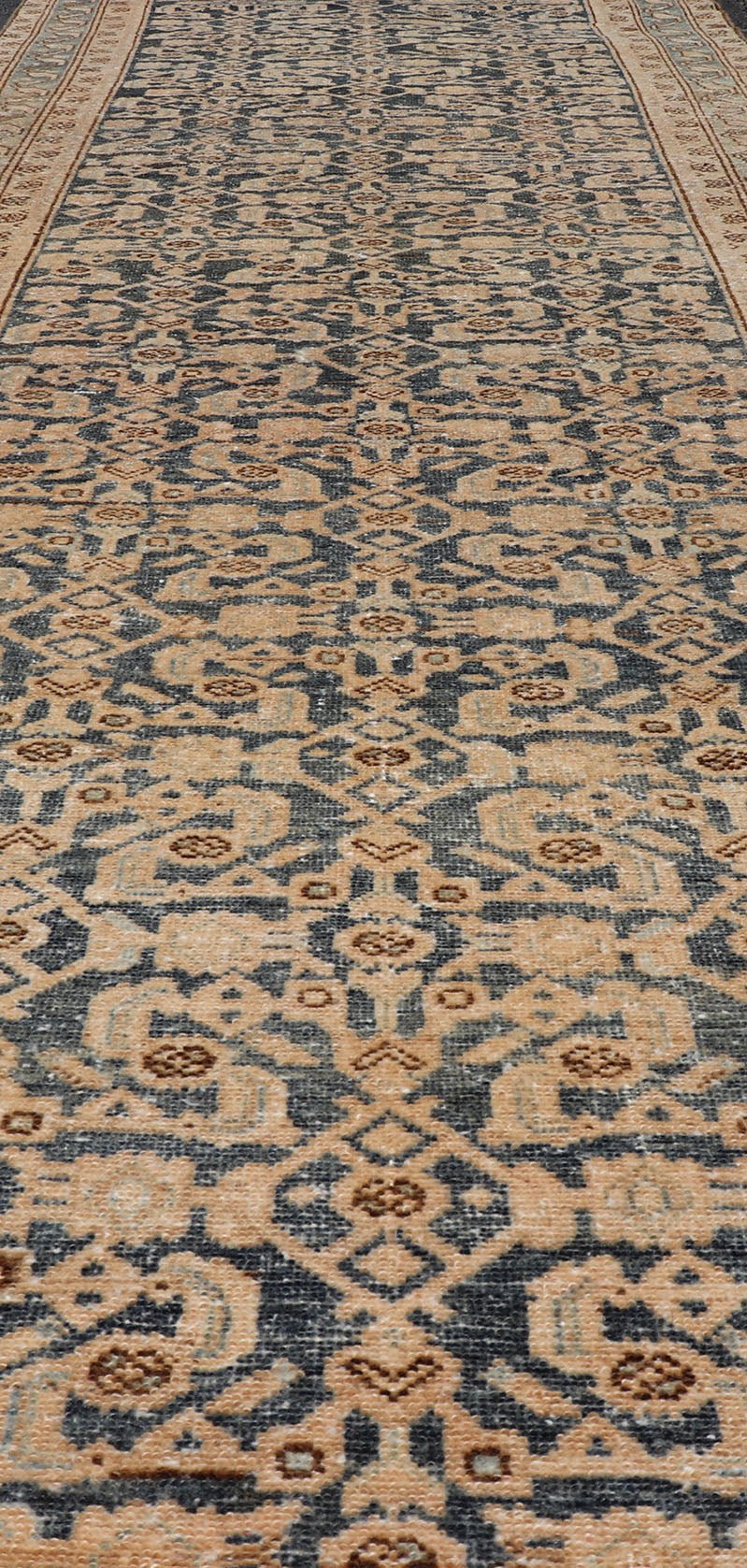 Antique Hamedan Gallery Runner with Herati Design in Dark Gray & Charcoal This vintage Hamedan was hand - knotted in Iran during the 1930's. The center field displays a Herati design, nicknamed the "fish" design in a creamy apricot color. Th... - Keivan Woven ArtsV21 - 211023 - 18523Rug