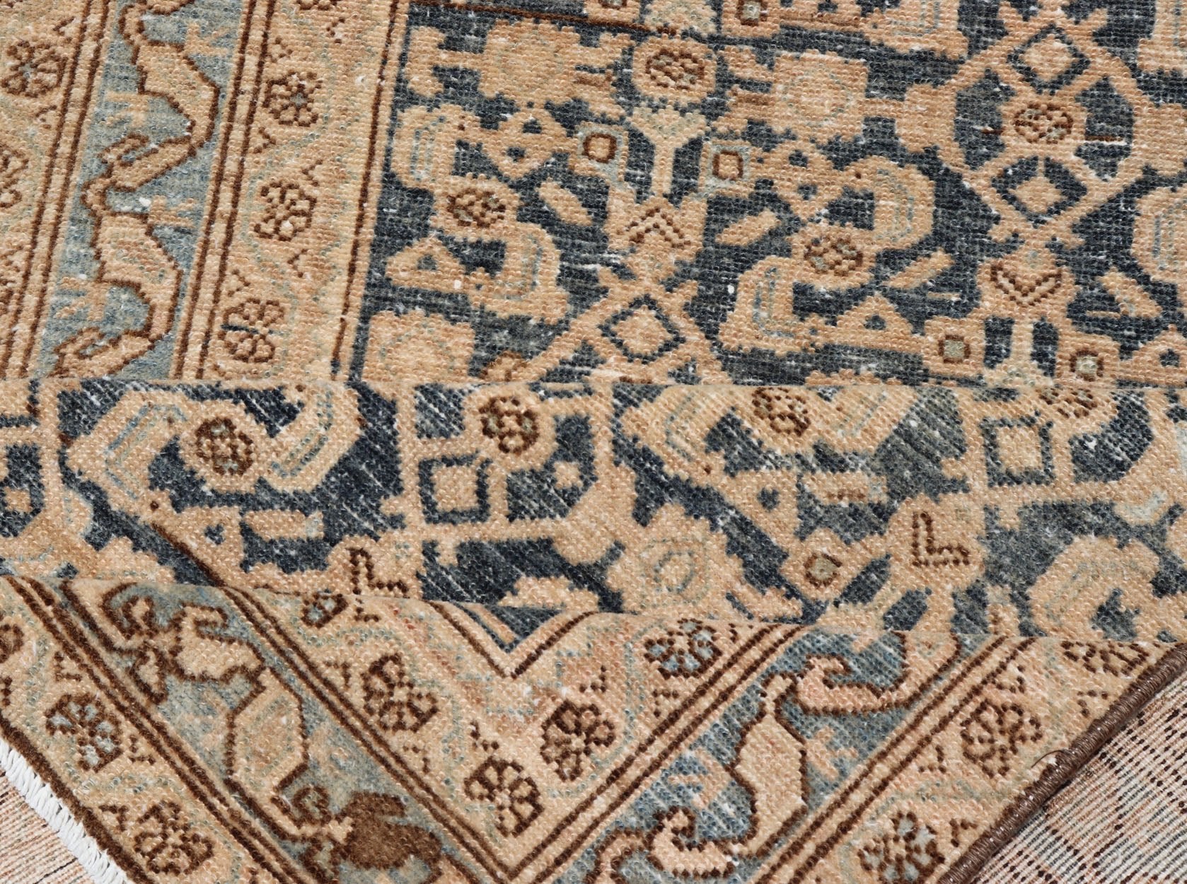 Antique Hamedan Gallery Runner with Herati Design in Dark Gray & Charcoal This vintage Hamedan was hand - knotted in Iran during the 1930's. The center field displays a Herati design, nicknamed the "fish" design in a creamy apricot color. Th... - Keivan Woven ArtsV21 - 211023 - 18523Rug