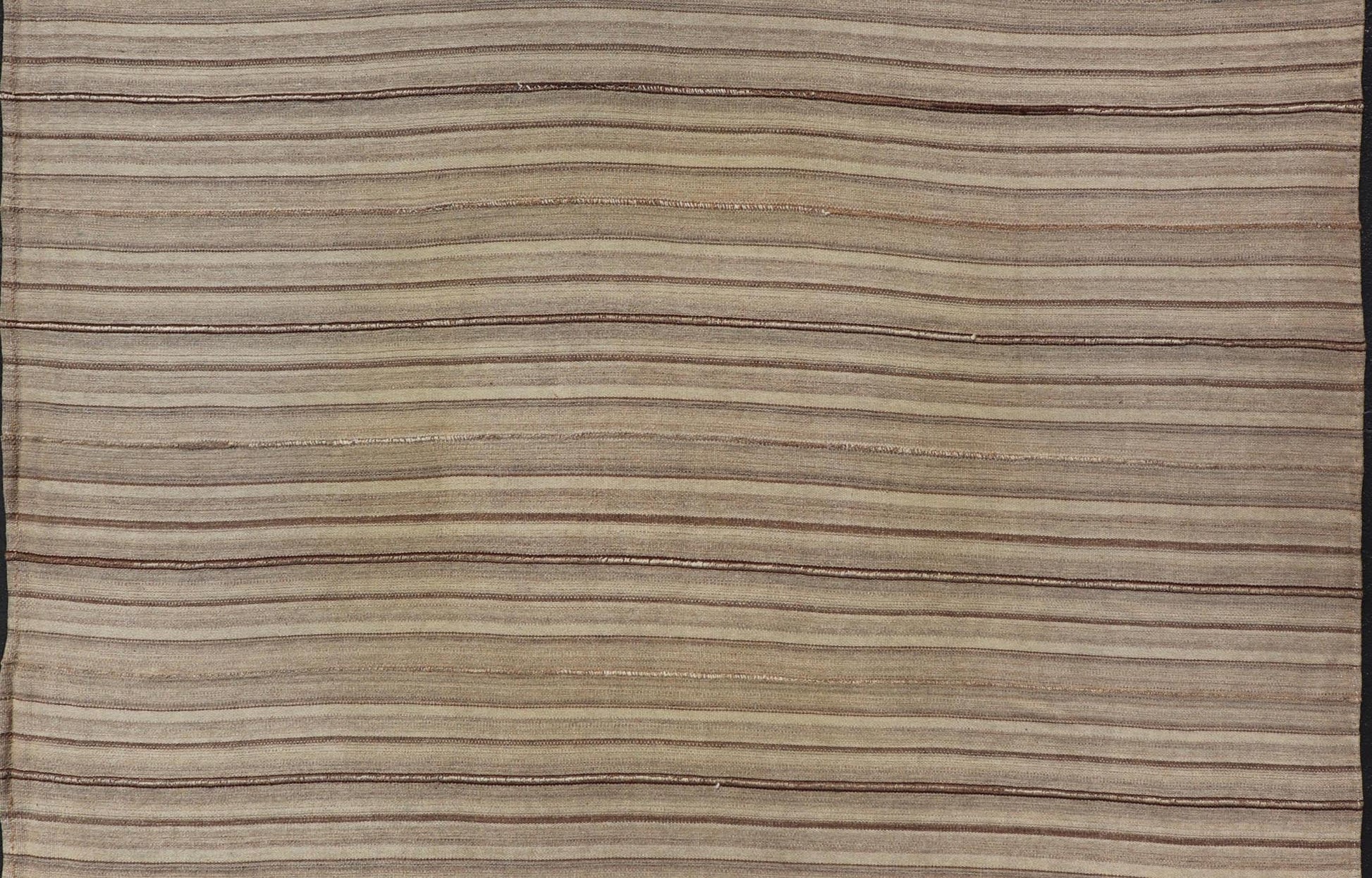 Square Antique Hand - Woven Persian Kilim Rug in Wool with Striped Design This Square flat - weave tribal Persian kilim has been hand - woven in wool. The rug features an all - over striped design, and is rendered in earthy tones; making this rug a sup... - Keivan Woven ArtsV21 - 211025 - 14764