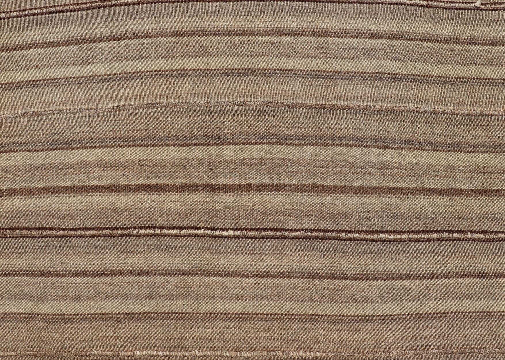 Square Antique Hand - Woven Persian Kilim Rug in Wool with Striped Design This Square flat - weave tribal Persian kilim has been hand - woven in wool. The rug features an all - over striped design, and is rendered in earthy tones; making this rug a sup... - Keivan Woven ArtsV21 - 211025 - 14764Rug