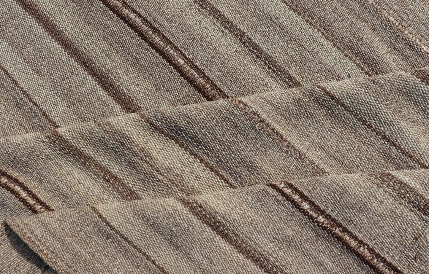 Square Antique Hand - Woven Persian Kilim Rug in Wool with Striped Design This Square flat - weave tribal Persian kilim has been hand - woven in wool. The rug features an all - over striped design, and is rendered in earthy tones; making this rug a sup... - Keivan Woven ArtsV21 - 211025 - 14764