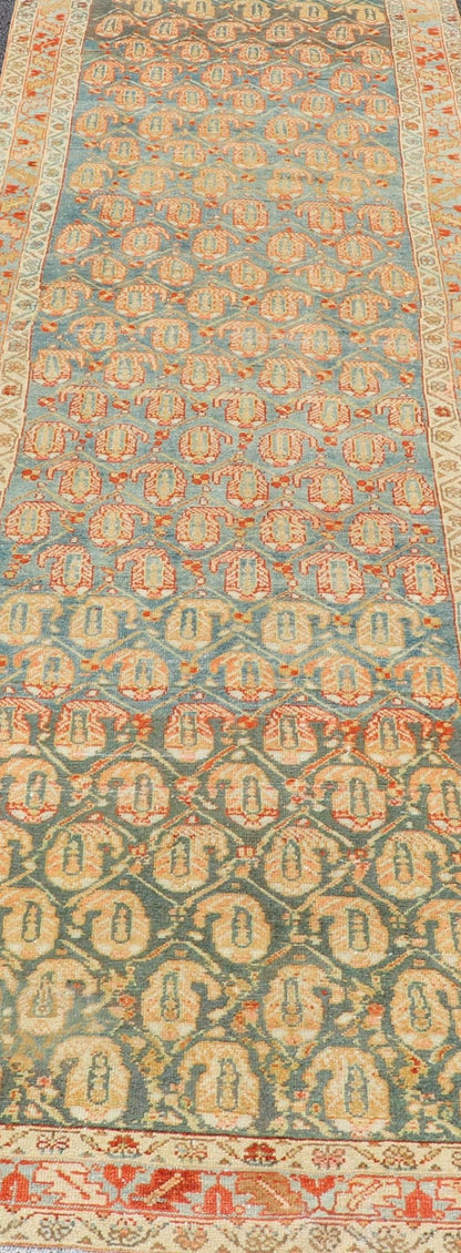 Long Antique Hand - Knotted Persian Malayer Runner in Wool with All - Over Design This long antique Persian Malayer runner has been hand - knotted in wool and features an all - over sub - geometric design rendered in multicolor. A complementary, multi - ti... - Keivan Woven ArtsVAS - 10 - 18138Rug