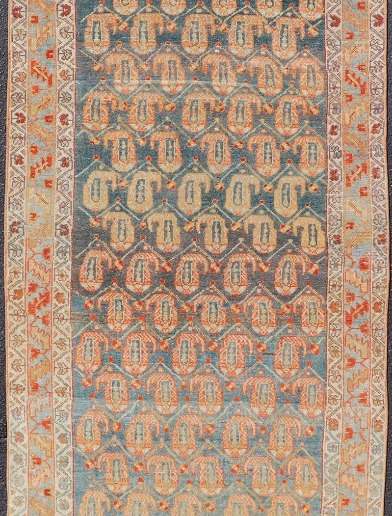 Long Antique Hand - Knotted Persian Malayer Runner in Wool with All - Over Design This long antique Persian Malayer runner has been hand - knotted in wool and features an all - over sub - geometric design rendered in multicolor. A complementary, multi - ti... - Keivan Woven ArtsVAS - 10 - 18138Rug