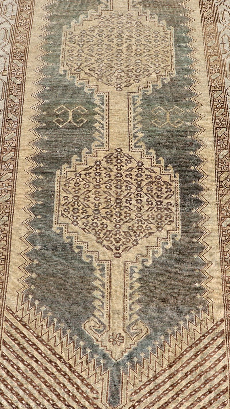 Antique N.W. Persian Runner in Gray Blue & Steel Blue Background & Medallions. Antique N.W. Persian Runner with connected Medallions. Keivan Woven Arts / rug VAS - 3 - 13986, country of origin / type: Iran / N.W. Persian, circa 1920. Measur... - Keivan Woven ArtsVAS - 3 - 13986 - 17394