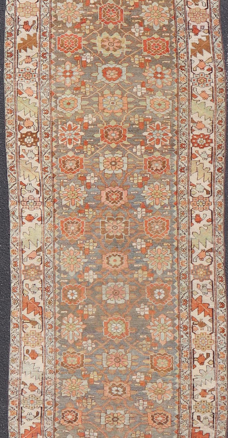 Antique Persian Bidjar Gallery Runner with Floral Design in Lt. Blue, Gray & Red. Antique Persian Bidjar Runner, rug VAS - 4 - 13494, country of origin / type: Persian / Bidjar, circa Early - 20th Century. Measures: 3'6 x 17'3 This stunning antique Bi... - Keivan Woven ArtsVAS - 4 - 13494 - 23559
