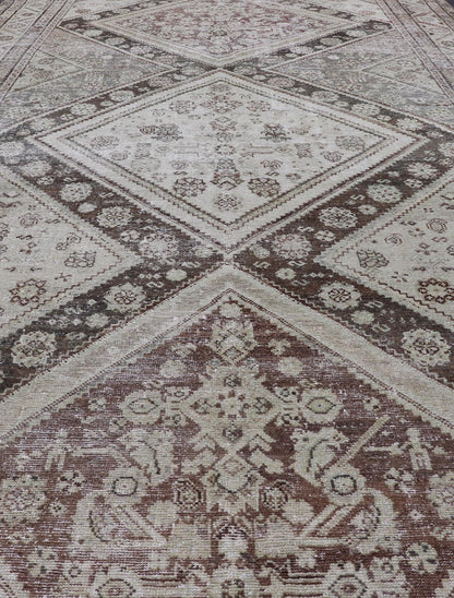 Antique Persian Mahal Gallery Rug with Medallion Design in Cream and Browns This antique Persian Mahal gallery rug has been hand - knotted in wool and features an all - over sub - geometric medallion design rendered in multicolor. A complementary, mu... - Keivan Woven ArtsVAS - 5 - 13988 - 17400