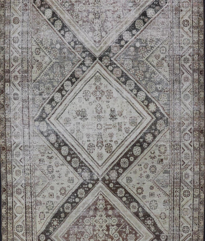 Antique Persian Mahal Gallery Rug with Medallion Design in Cream and Browns This antique Persian Mahal gallery rug has been hand - knotted in wool and features an all - over sub - geometric medallion design rendered in multicolor. A complementary, mu... - Keivan Woven ArtsVAS - 5 - 13988 - 17400