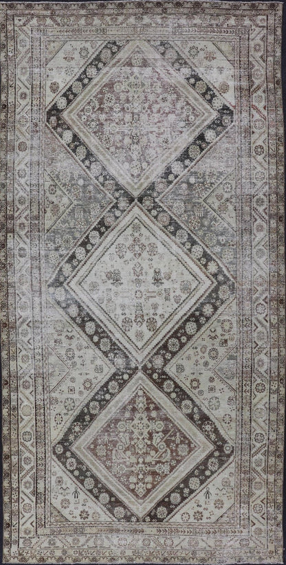 Antique Persian Mahal Gallery Rug with Medallion Design in Cream and Browns This antique Persian Mahal gallery rug has been hand - knotted in wool and features an all - over sub - geometric medallion design rendered in multicolor. A complementary, mu... - Keivan Woven ArtsVAS - 5 - 13988 - 17400Rug