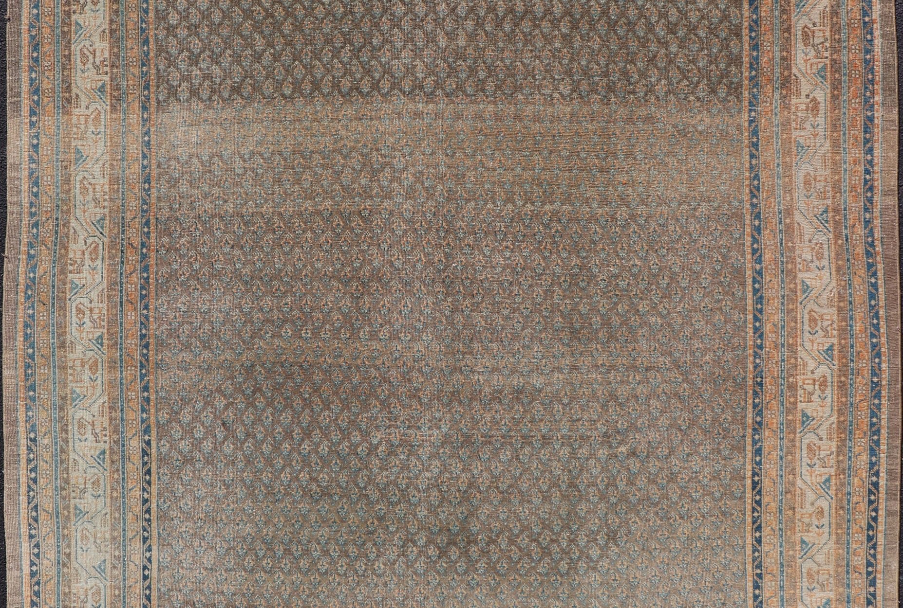 Antique Persian Tabriz Rug with All - Over Small Motif Design in Brown and Blue. Persian 1930's Tabriz Rug with All - Over Small Motif Design in Brown and Blue and neutral tones. Keivan Woven Arts / rug VAS - 50681, country of origin / type: Persian / Tabriz... - Keivan Woven ArtsVAS - 50681 - 22626