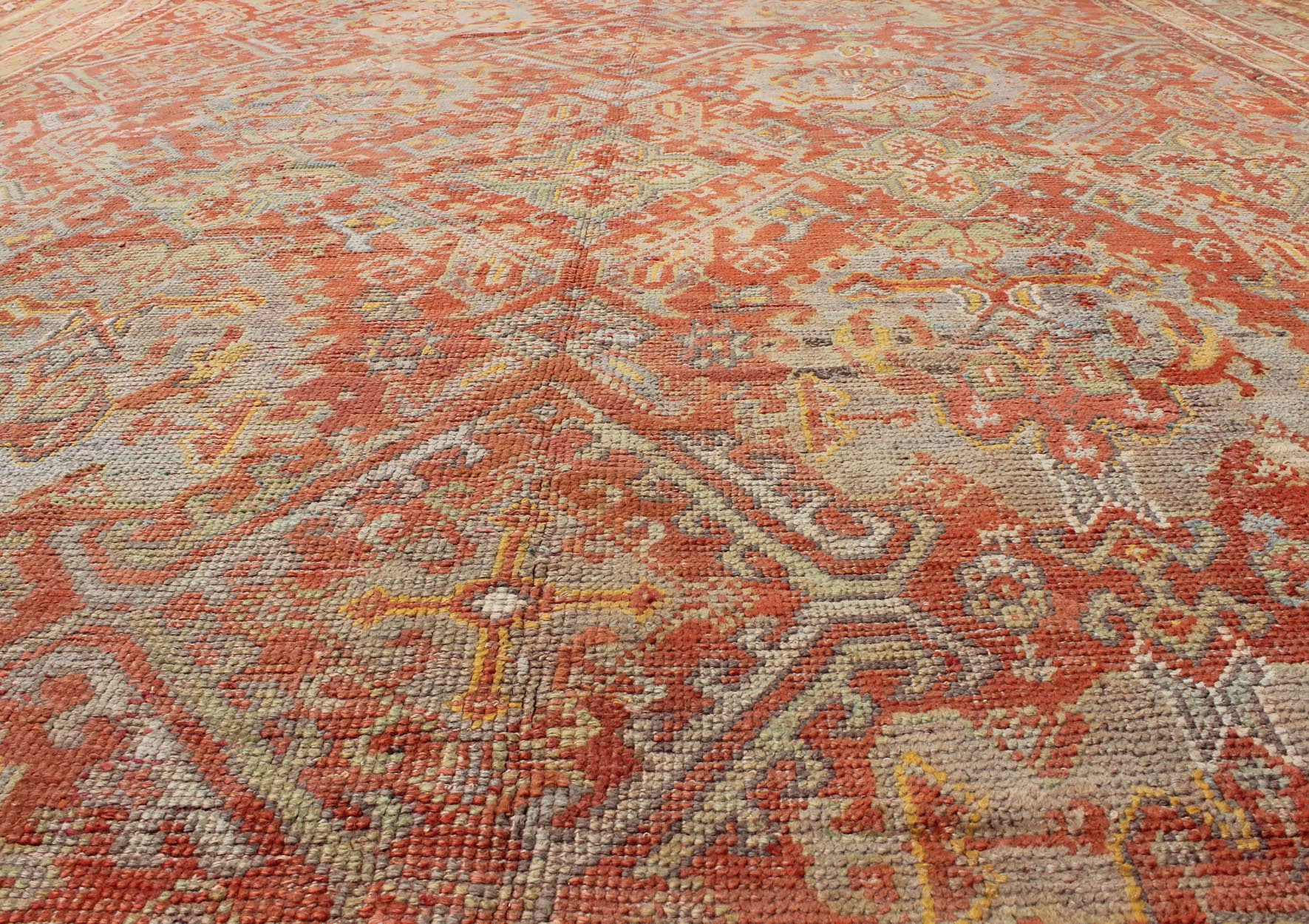 Antique Turkish Oushak Rug with Geometric Design in Soft Red, Light Blue, Yellow, Taupe and Gray. Antique Oushak / Keivan Woven Arts / rug VR - 6061, country of origin / type: Turkey / Oushak, circa Early - 20th century Measures: 12' x 17'. This anti... - Keivan Woven ArtsVR - 6061 - 241Rug