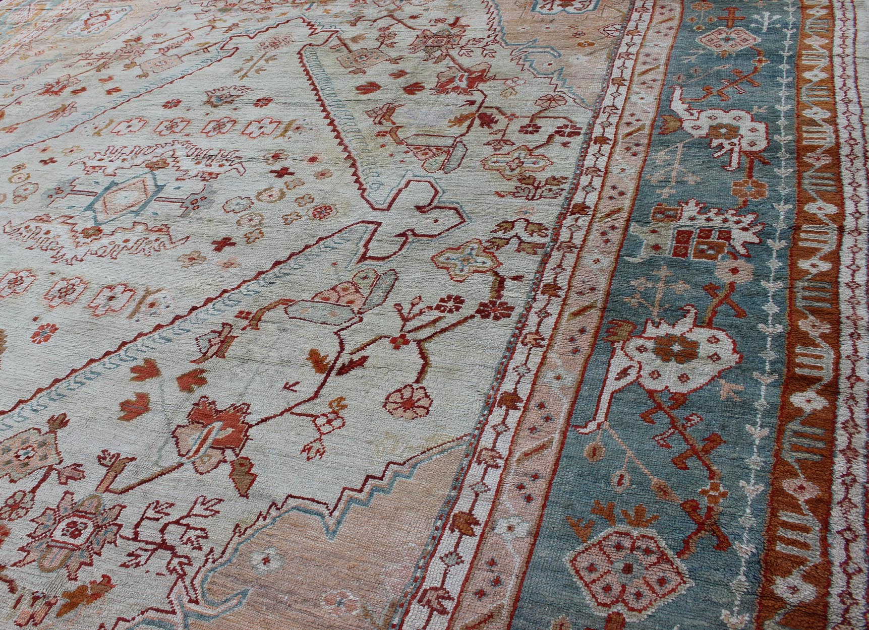 Antique Turkish Oushak rug in ice blue, taupe background and teal border. Keivan Woven Arts / rug VR - 7967, country of origin / type: Turkey / Oushak, circa Early - 20th century. Measures: 12'1 x 14'10. This magnificent Turkish Oushak carpet beautif... - Keivan Woven ArtsVR - 7967 - 385Rug