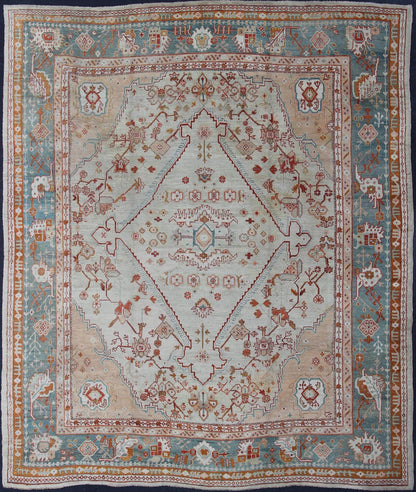 Antique Turkish Oushak rug in ice blue, taupe background and teal border. Keivan Woven Arts / rug VR - 7967, country of origin / type: Turkey / Oushak, circa Early - 20th century. Measures: 12'1 x 14'10. This magnificent Turkish Oushak carpet beautif... - Keivan Woven ArtsVR - 7967 - 385Rug