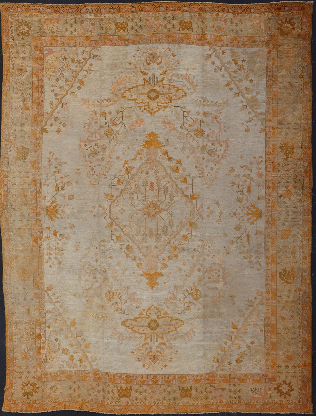 Remarkable Antique Turkish Oushak Carpet - The grand scale of this magnificent palace - sized antique Oushak is tempered only by its beautifully understated color palette. The open center field is presented in a luxurious pale ivory, richly complemented by... - Keivan Woven ArtsVR - 7984 - 299Rug