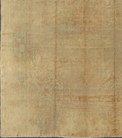 Antique Hand Knotted Borlu Oushak Rug In Soft Cream Goldish Tones Antique Borlu Oushakrug with a minimal center medallion design in light tones, circa 1910, Keivan Woven Arts / rug vr - 8561, country of origin / type: Turkey / Oushak, circa 1910.... - Keivan Woven ArtsVR - 8561 - 1720Rug