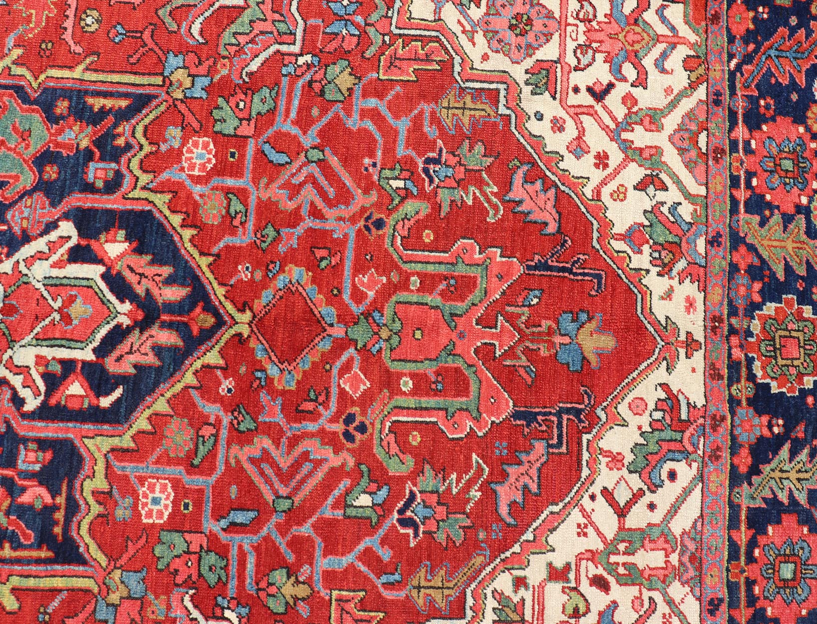 Antique Heriz Carpet with Stylized Central Medallion Set on Tomato Red Field. Antique Heriz Carpet with Stylized Central Medallion Set on Tomato Red Field. Keivan Woven Arts / Rug / VR - 8759 / country of origin / type: Persian / Serapi, circa ea... - Keivan Woven ArtsVR - 8759 - 1 - 24745Rugs