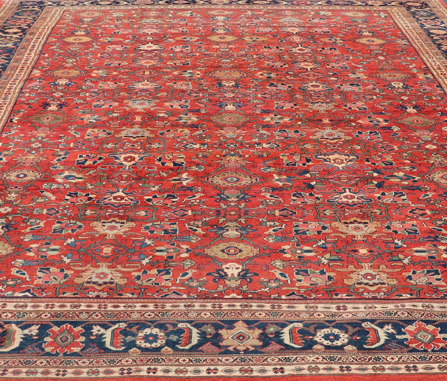Large Antique Persian Sultanabad Rug - This large and inspiring Sultanabad from the turn of the century draws heavily on nature for its harmonious design. A luxurious field of soft tomato red contains a meticulous array of interconnected geomorphic flora... - Keivan Woven ArtsVR - 9004 - 349Rug