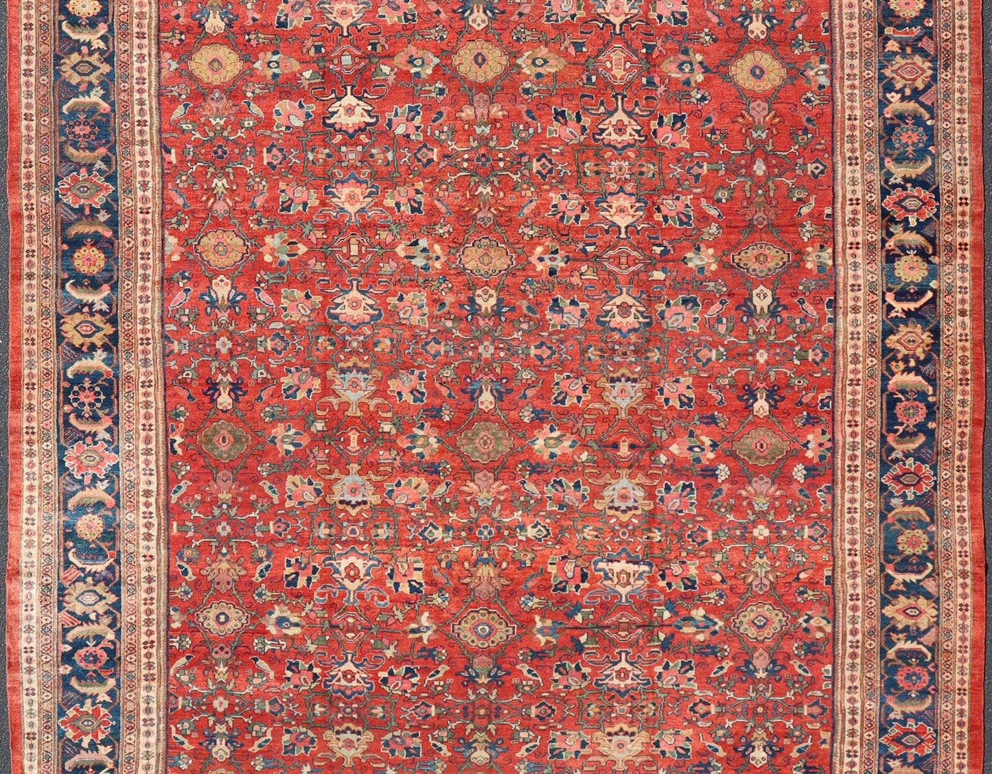 Large Antique Persian Sultanabad Rug - This large and inspiring Sultanabad from the turn of the century draws heavily on nature for its harmonious design. A luxurious field of soft tomato red contains a meticulous array of interconnected geomorphic flora... - Keivan Woven ArtsVR - 9004 - 349Rug