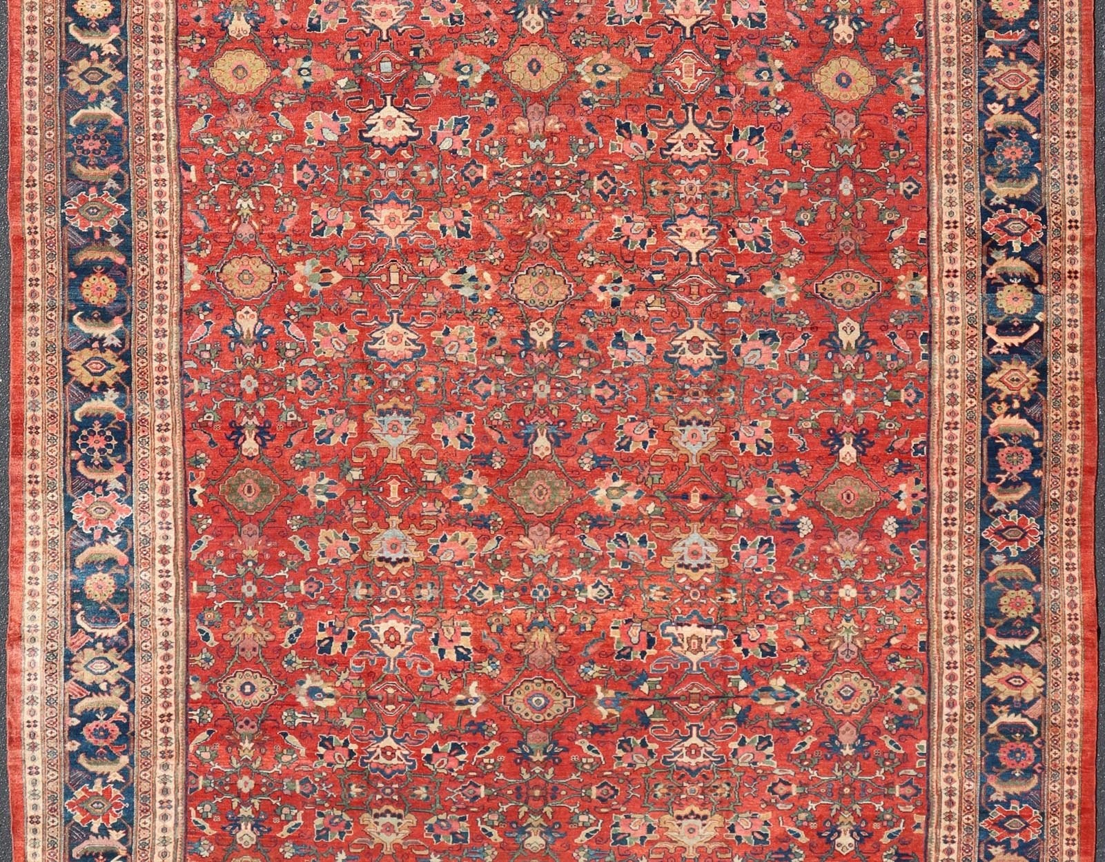 Large Antique Persian Sultanabad Rug - This large and inspiring Sultanabad from the turn of the century draws heavily on nature for its harmonious design. A luxurious field of soft tomato red contains a meticulous array of interconnected geomorphic flora... - Keivan Woven ArtsVR - 9004 - 349Rug