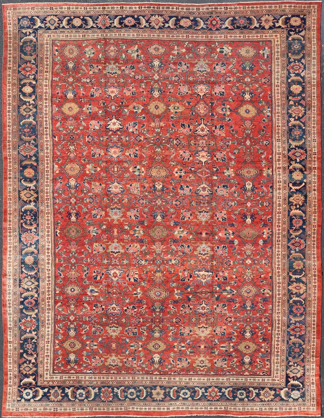 Large Antique Persian Sultanabad Rug - This large and inspiring Sultanabad from the turn of the century draws heavily on nature for its harmonious design. A luxurious field of soft tomato red contains a meticulous array of interconnected geomorphic flora... - Keivan Woven ArtsVR - 9004 - 349Rug