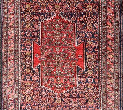 Antique Persian Bidjar Medallion Designed Carpet with of Blue's, Red, and Pink Measures: 4'5 x 6'7 The rug has a central medallion, surrounded by an intricate floral Herati design. The border utilizes softer colors of pink, blue and yel... - Keivan Woven ArtsW22 - 0102 - 18577