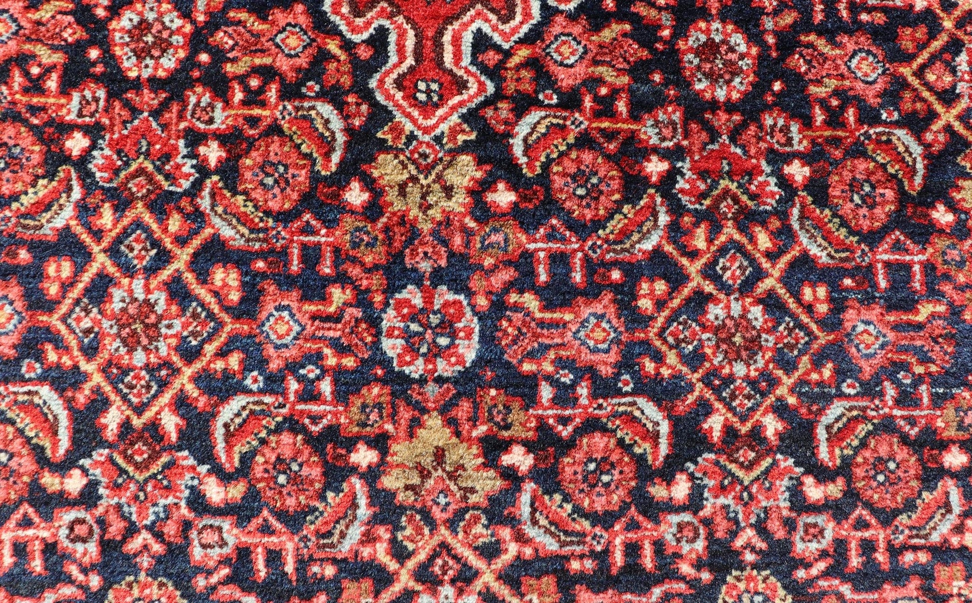 Antique Persian Bidjar Medallion Designed Carpet with of Blue's, Red, and Pink Measures: 4'5 x 6'7 The rug has a central medallion, surrounded by an intricate floral Herati design. The border utilizes softer colors of pink, blue and yel... - Keivan Woven ArtsW22 - 0102 - 18577