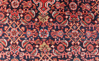 Antique Persian Bidjar Medallion Designed Carpet with of Blue's, Red, and Pink Measures: 4'5 x 6'7 The rug has a central medallion, surrounded by an intricate floral Herati design. The border utilizes softer colors of pink, blue and yel... - Keivan Woven ArtsW22 - 0102 - 18577