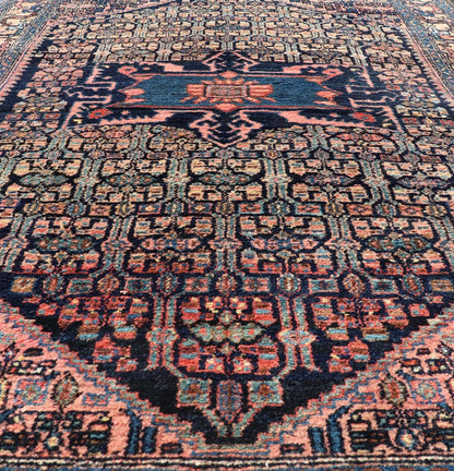 Antique Bibiakabad Rug with Layered Medallion and Geometric Design in Background Blue, dark blue, pink, and tan Bibiakabad antique rug Persian, Keivan Woven Arts / rug W22 - 0103, country of origin / type: Iran / Bibiakabad , circa 1920. ... - Keivan Woven ArtsW22 - 0103 - 18583Rug