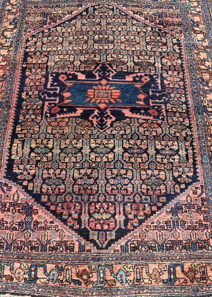 Antique Bibiakabad Rug with Layered Medallion and Geometric Design in Background Blue, dark blue, pink, and tan Bibiakabad antique rug Persian, Keivan Woven Arts / rug W22 - 0103, country of origin / type: Iran / Bibiakabad , circa 1920. ... - Keivan Woven ArtsW22 - 0103 - 18583