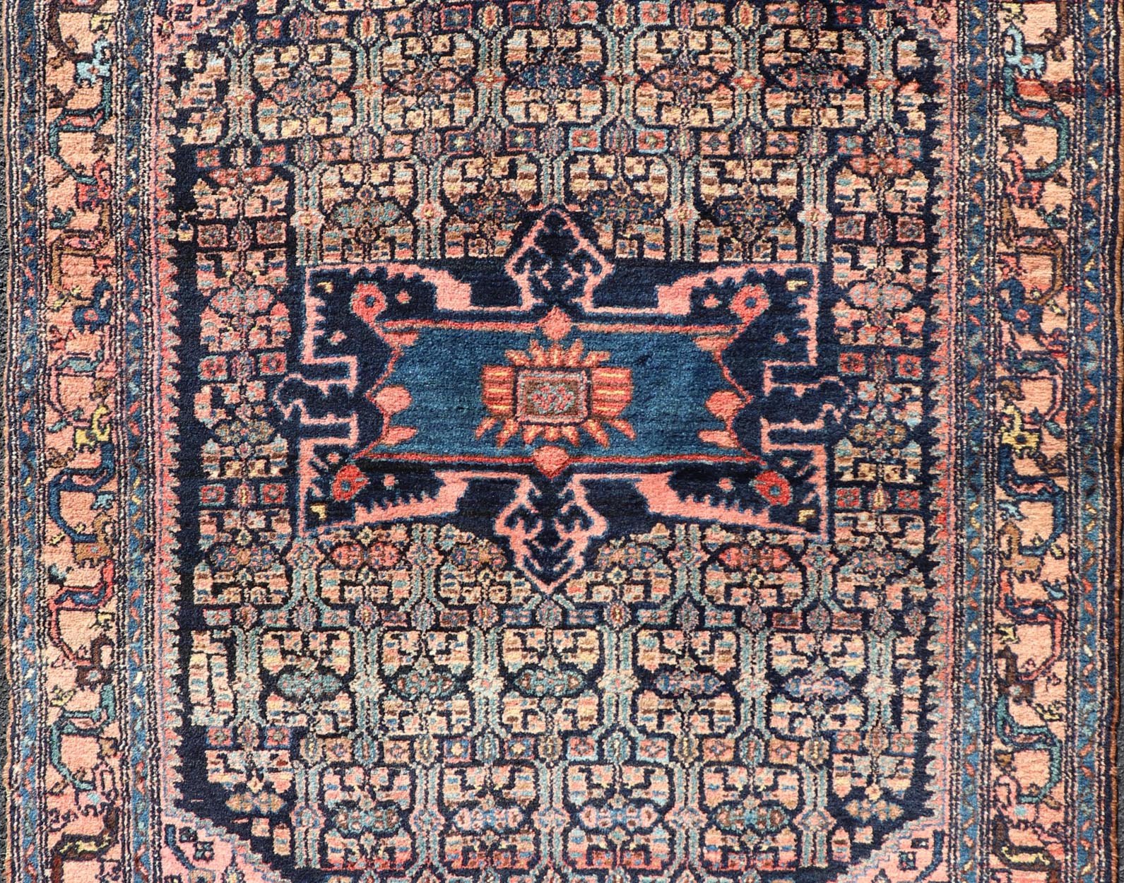 Antique Bibiakabad Rug with Layered Medallion and Geometric Design in Background Blue, dark blue, pink, and tan Bibiakabad antique rug Persian, Keivan Woven Arts / rug W22 - 0103, country of origin / type: Iran / Bibiakabad , circa 1920. ... - Keivan Woven ArtsW22 - 0103 - 18583Rug