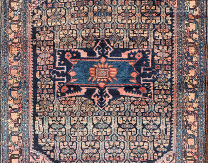 Antique Bibiakabad Rug with Layered Medallion and Geometric Design in Background Blue, dark blue, pink, and tan Bibiakabad antique rug Persian, Keivan Woven Arts / rug W22 - 0103, country of origin / type: Iran / Bibiakabad , circa 1920. ... - Keivan Woven ArtsW22 - 0103 - 18583Rug