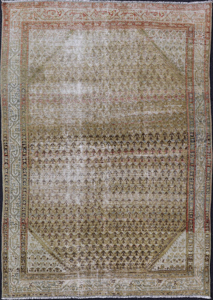 Antique Saraband Persian Rug with Small Paisley in chartreuse yellow Background. Distressed Antique Saraband Persian Rug with Small Paisley in chartreuse yellow Background. Keivan Woven Arts / rug W22 - 0105, country of origin / type: Iran / Sar... - Keivan Woven ArtsW22 - 0105 - 18595
