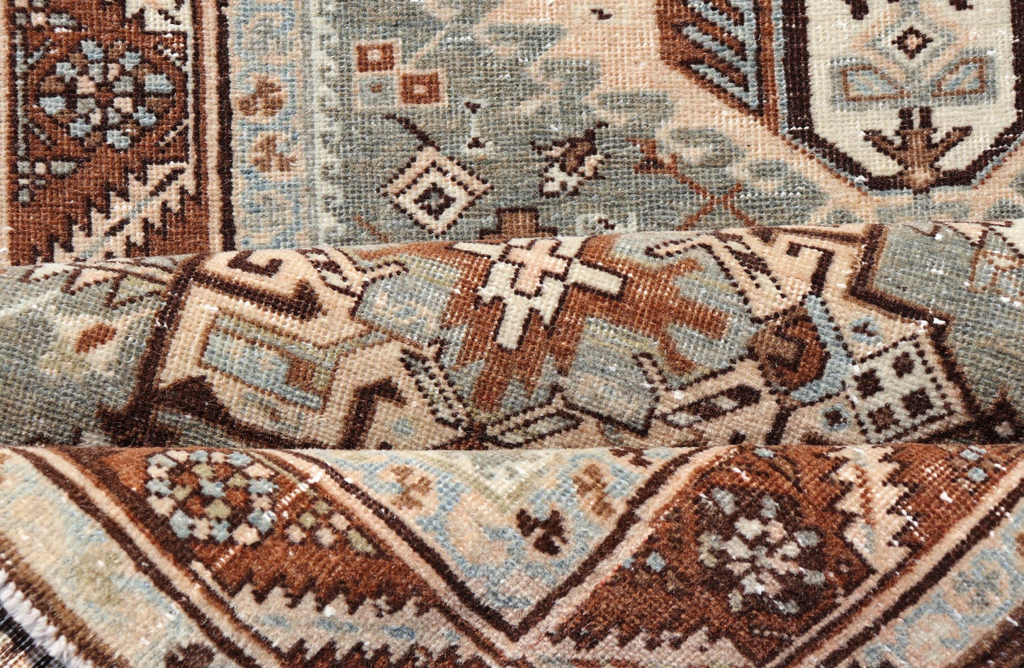 Antique Persian Heriz Runner in Wool with Geometric Medallions in gray Blue, light gray green and Brown. Keivan Woven Arts; rug W22 - 0107, country of origin / type: Iran / Heriz, circa 1920. Measures: 3'2 x 14'4 This antique Persian Heriz... - Keivan Woven ArtsW22 - 0107 - 19064