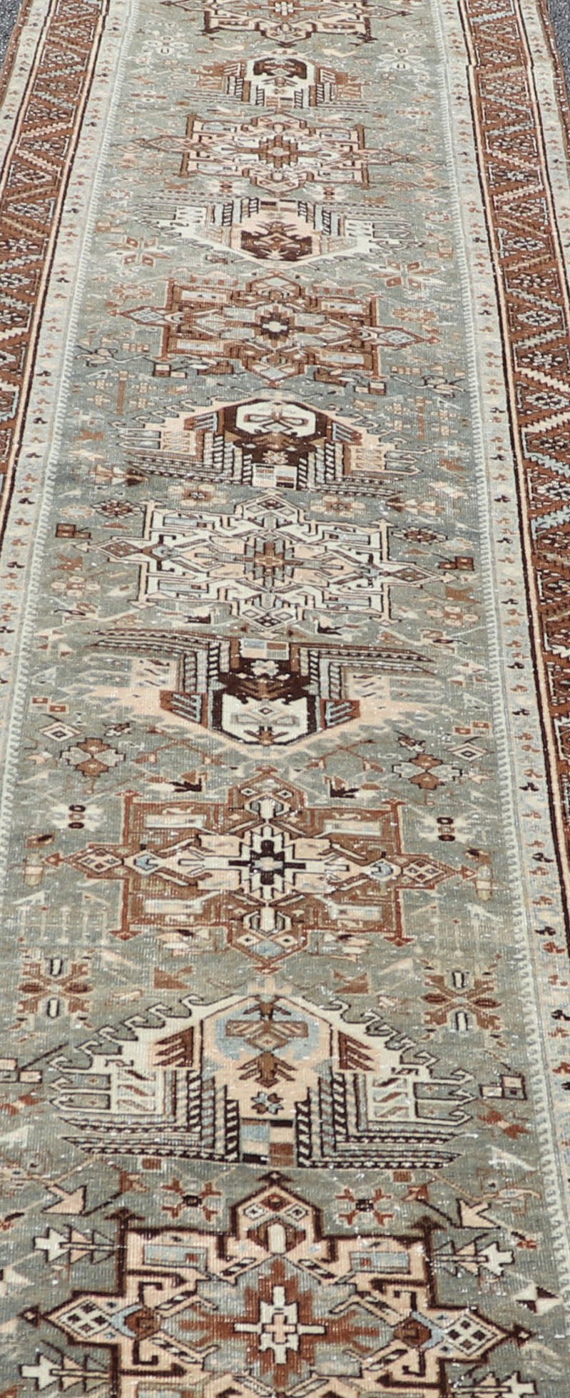 Antique Persian Heriz Runner in Wool with Geometric Medallions in gray Blue, light gray green and Brown. Keivan Woven Arts; rug W22 - 0107, country of origin / type: Iran / Heriz, circa 1920. Measures: 3'2 x 14'4 This antique Persian Heriz... - Keivan Woven ArtsW22 - 0107 - 19064