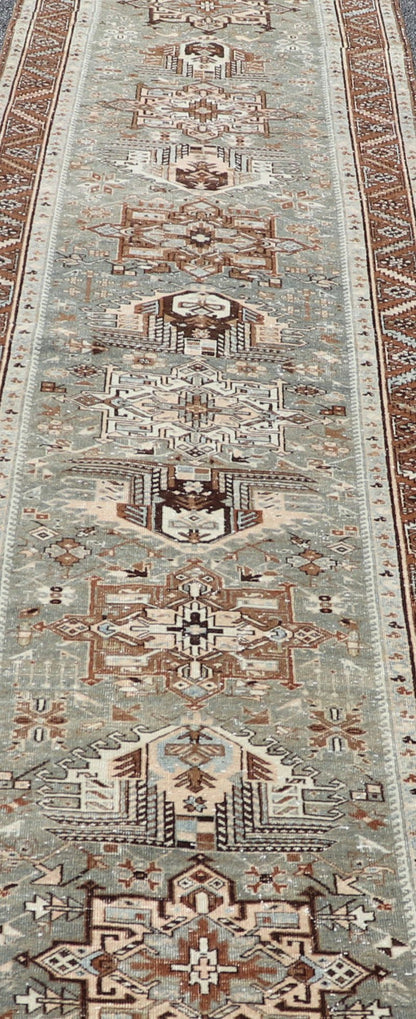 Antique Persian Heriz Runner in Wool with Geometric Medallions in gray Blue, light gray green and Brown. Keivan Woven Arts; rug W22 - 0107, country of origin / type: Iran / Heriz, circa 1920. Measures: 3'2 x 14'4 This antique Persian Heriz... - Keivan Woven ArtsW22 - 0107 - 19064