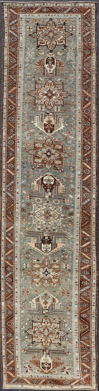 Antique Persian Heriz Runner in Wool with Geometric Medallions in gray Blue, light gray green and Brown. Keivan Woven Arts; rug W22 - 0107, country of origin / type: Iran / Heriz, circa 1920. Measures: 3'2 x 14'4 This antique Persian Heriz... - Keivan Woven ArtsW22 - 0107 - 19064