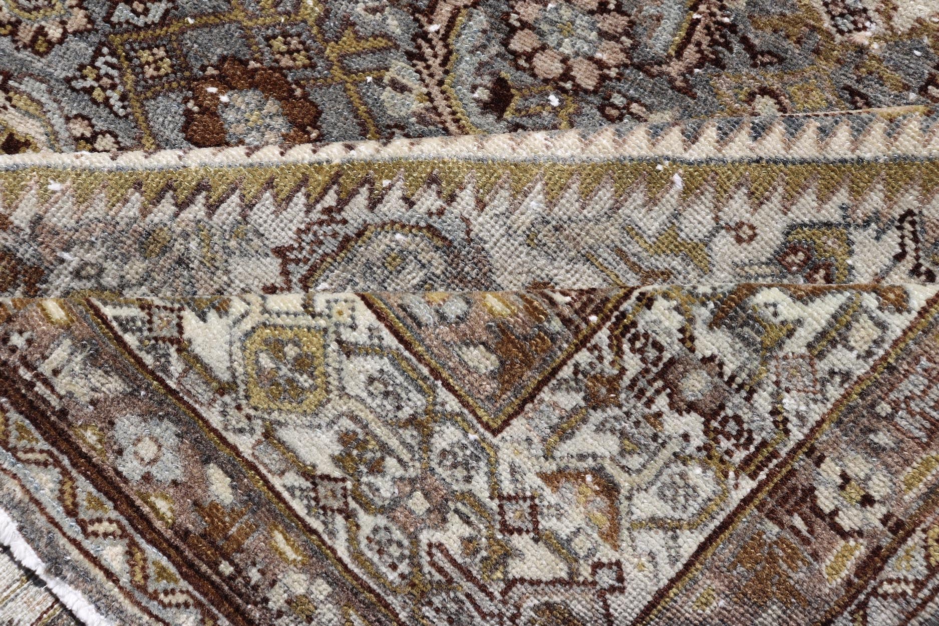 Antique Persian Bibikabad Carpet with Steal Blue, Charcoal, Green, and Brown. Keivan Woven Arts / rug W22 - 0108, country of origin / type: Iran / Bibikabad, circa 1920. Measures: 6'2 x 9'2 This antique Persian Bibikabad carpet, from t... - Keivan Woven ArtsW22 - 0108 - 19070