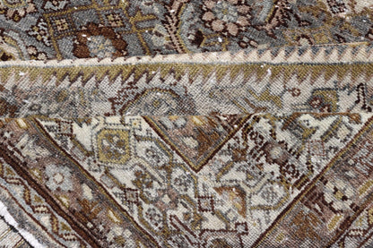 Antique Persian Bibikabad Carpet with Steal Blue, Charcoal, Green, and Brown. Keivan Woven Arts / rug W22 - 0108, country of origin / type: Iran / Bibikabad, circa 1920. Measures: 6'2 x 9'2 This antique Persian Bibikabad carpet, from t... - Keivan Woven ArtsW22 - 0108 - 19070