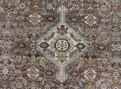 Antique Persian Bibikabad Carpet with Steal Blue, Charcoal, Green, and Brown. Keivan Woven Arts / rug W22 - 0108, country of origin / type: Iran / Bibikabad, circa 1920. Measures: 6'2 x 9'2 This antique Persian Bibikabad carpet, from t... - Keivan Woven ArtsW22 - 0108 - 19070Rug