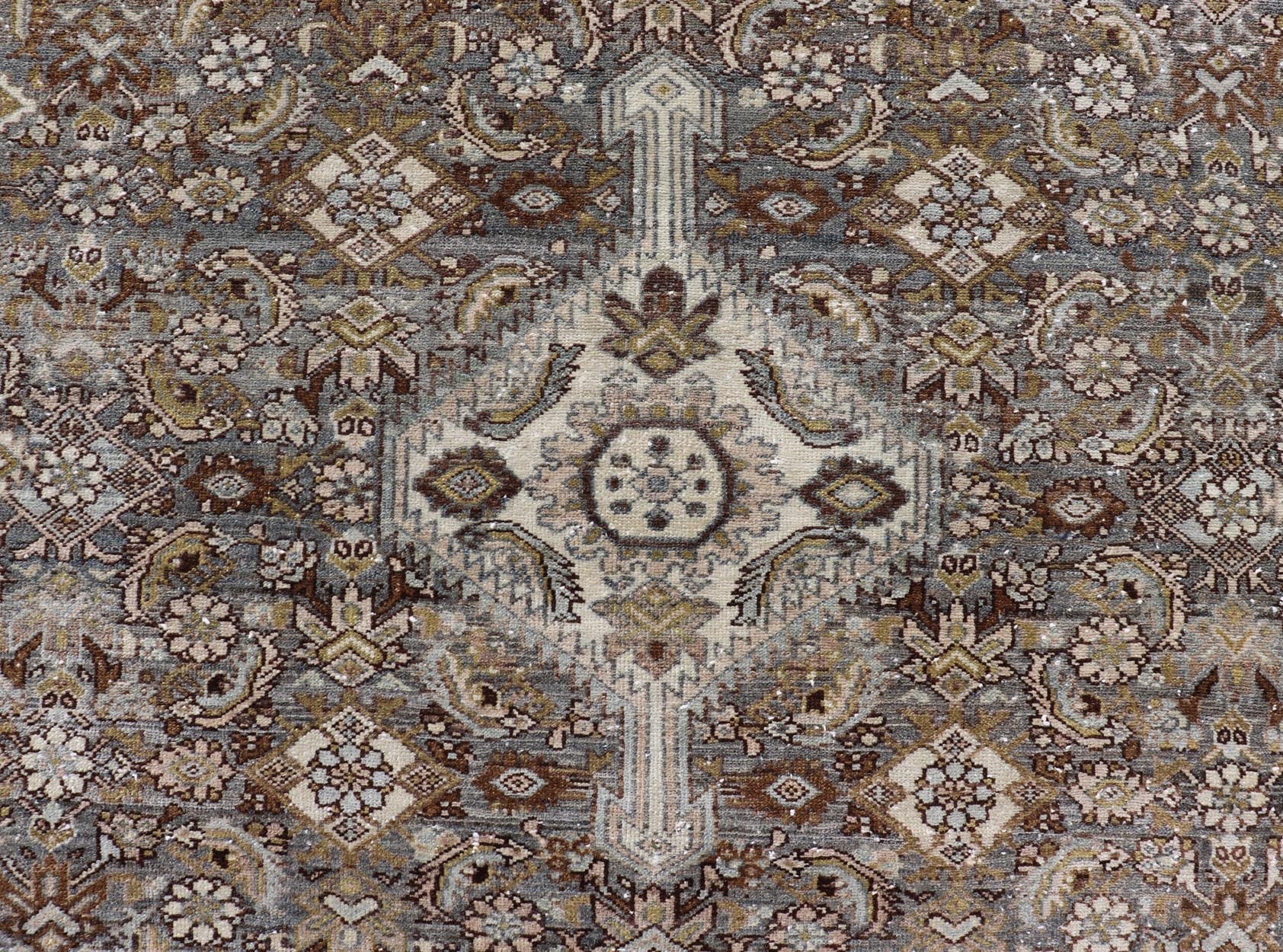 Antique Persian Bibikabad Carpet with Steal Blue, Charcoal, Green, and Brown. Keivan Woven Arts / rug W22 - 0108, country of origin / type: Iran / Bibikabad, circa 1920. Measures: 6'2 x 9'2 This antique Persian Bibikabad carpet, from t... - Keivan Woven ArtsW22 - 0108 - 19070