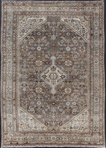 Antique Persian Bibikabad Carpet with Steal Blue, Charcoal, Green, and Brown. Keivan Woven Arts / rug W22 - 0108, country of origin / type: Iran / Bibikabad, circa 1920. Measures: 6'2 x 9'2 This antique Persian Bibikabad carpet, from t... - Keivan Woven ArtsW22 - 0108 - 19070Rug