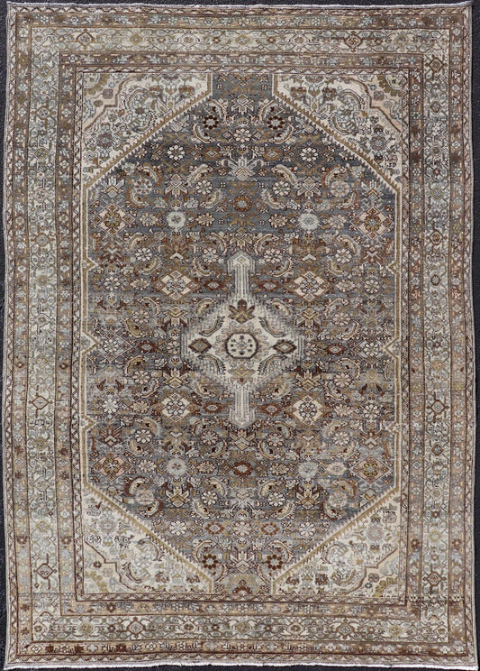 Antique Persian Bibikabad Carpet with Steal Blue, Charcoal, Green, and Brown. Keivan Woven Arts / rug W22 - 0108, country of origin / type: Iran / Bibikabad, circa 1920. Measures: 6'2 x 9'2 This antique Persian Bibikabad carpet, from t... - Keivan Woven ArtsW22 - 0108 - 19070Rug