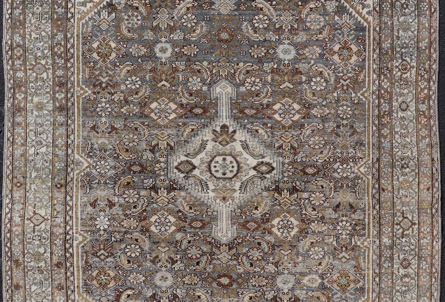 Antique Persian Bibikabad Carpet with Steal Blue, Charcoal, Green, and Brown. Keivan Woven Arts / rug W22 - 0108, country of origin / type: Iran / Bibikabad, circa 1920. Measures: 6'2 x 9'2 This antique Persian Bibikabad carpet, from t... - Keivan Woven ArtsW22 - 0108 - 19070