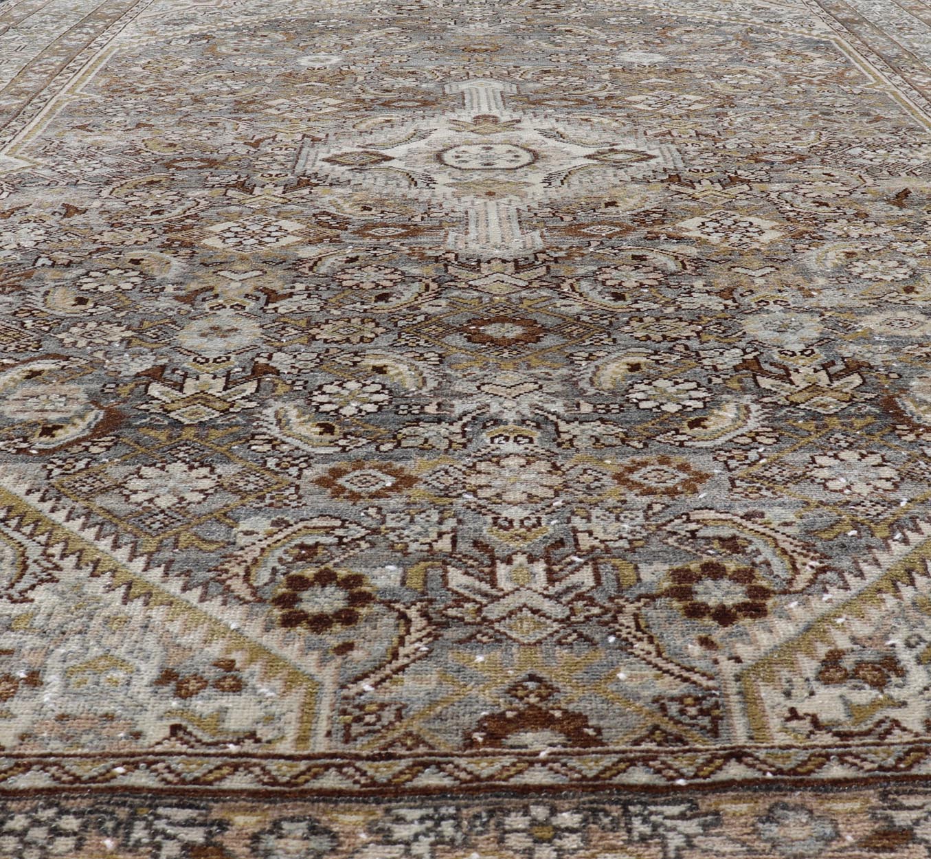 Antique Persian Bibikabad Carpet with Steal Blue, Charcoal, Green, and Brown. Keivan Woven Arts / rug W22 - 0108, country of origin / type: Iran / Bibikabad, circa 1920. Measures: 6'2 x 9'2 This antique Persian Bibikabad carpet, from t... - Keivan Woven ArtsW22 - 0108 - 19070