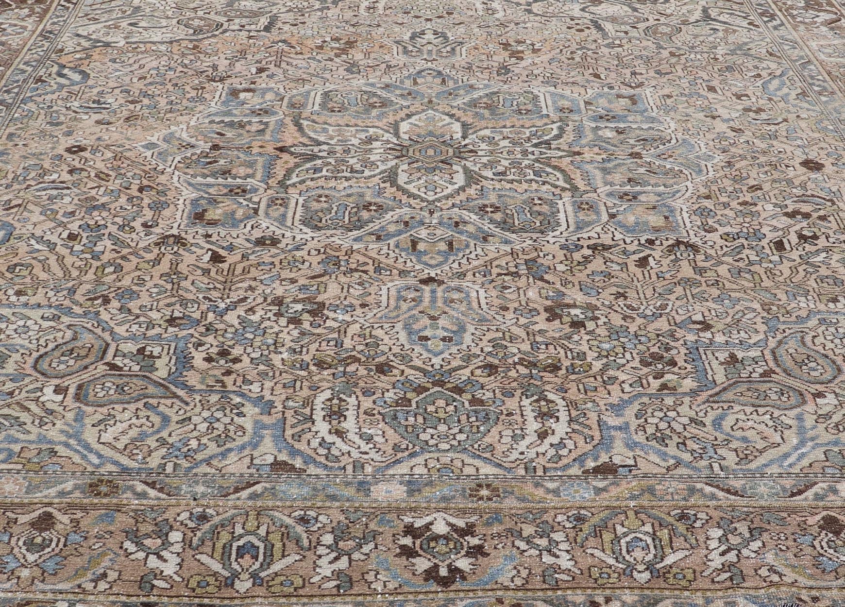 Square Antique Persian Bakhtiari Rug with Large Ornate Central Medallion Design. Keivan Woven Arts / Rug/W22 - 0206, antique Bakhtiari Mid - 20th Century Origin / Iran , Square rug, squared rug. Measures: 12'4 x 12'6 This multicolored Persia... - Keivan Woven ArtsW22 - 0206 - 19280