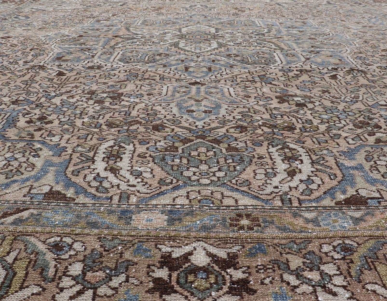 Square Antique Persian Bakhtiari Rug with Large Ornate Central Medallion Design. Keivan Woven Arts / Rug/W22 - 0206, antique Bakhtiari Mid - 20th Century Origin / Iran , Square rug, squared rug. Measures: 12'4 x 12'6 This multicolored Persia... - Keivan Woven ArtsW22 - 0206 - 19280Rug