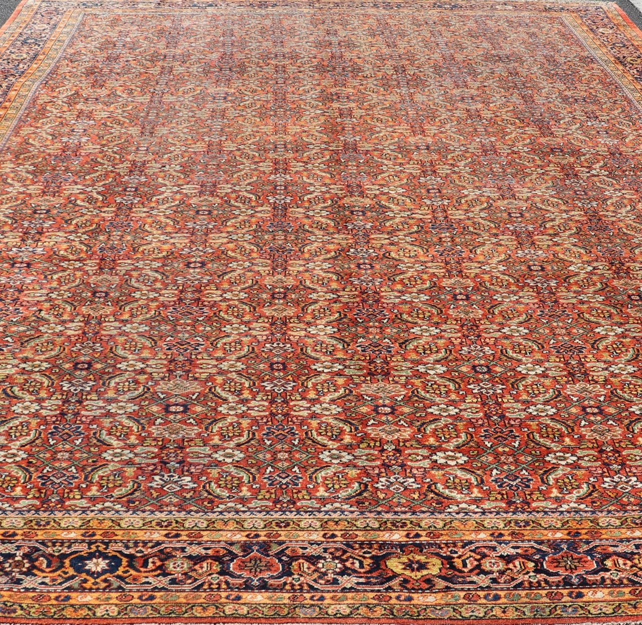 Palace Size Antique Persian Sultanabad Rug in Shades of Red, Blue, Orange, Green. Keivan Woven Arts / rug W22 - 0301 - 15493, country of origin / type: Iran / Sultanabad, circa 1910. Measures: 12'9 x 20'3 This sumptuous early 20th century antique Pe... - Keivan Woven ArtsW22 - 0301 - 15493 - 19316Rug