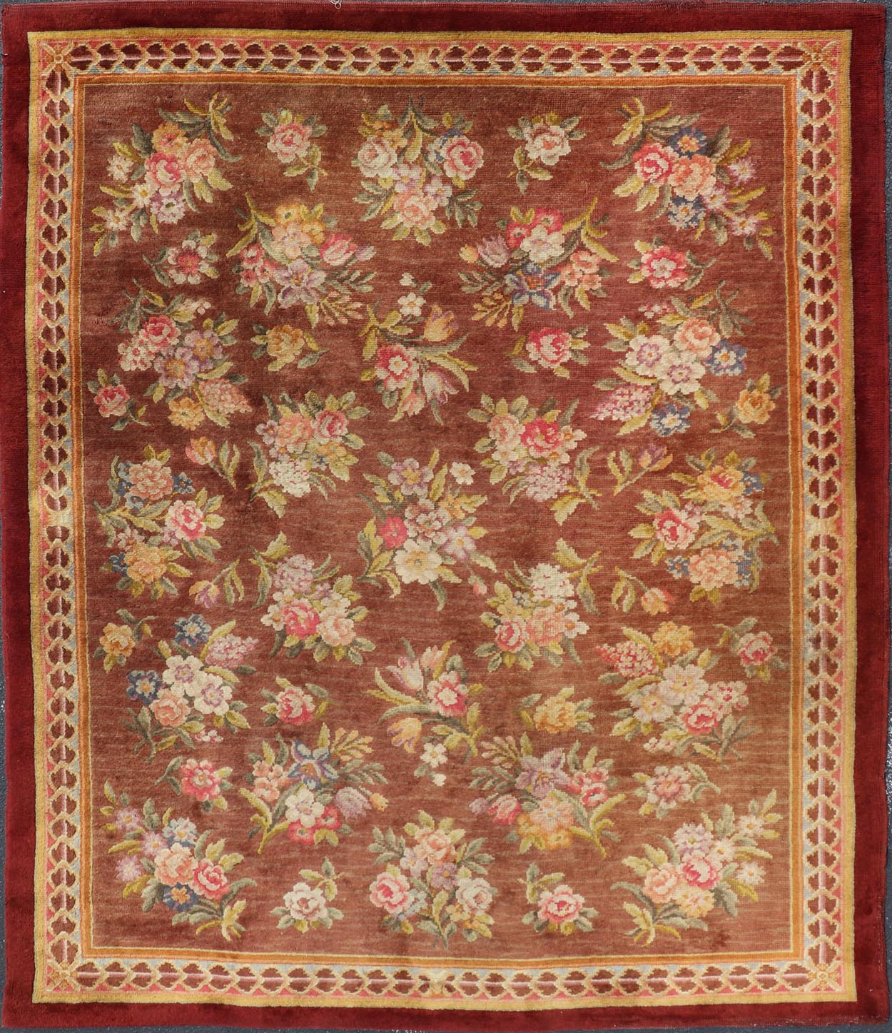 Antique Hand Knotted European Savonnerie Rug in Wool with Floral Design This antique French Savonnerie was in the Windcrofte house, the home of Robert Woodruff, the Coca Cola Magnate, and his wife Nell Woodruff. The rug sat in their upper landi... - Keivan Woven ArtsW22 - 0302 - 19322